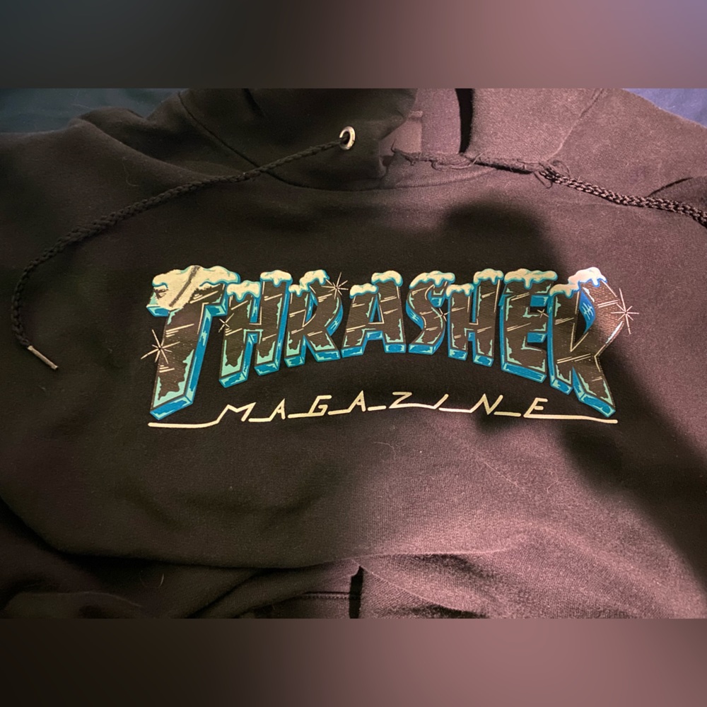 black thrasher hoodie with snow graphic